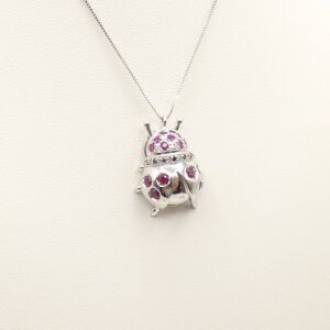Collana con pendente coccinella oro bianco con rubini e diamanti neri