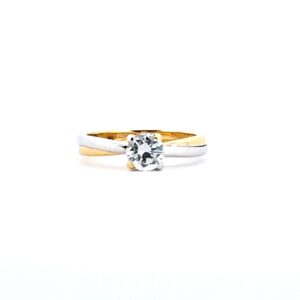 Solitario bicolore in oro bianco e giallo 18 KT con Diamante 0.66 ct centrale