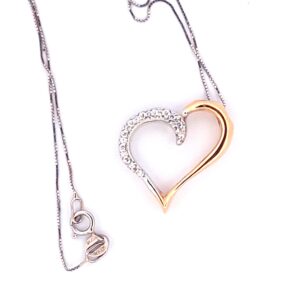 Collana in oro bianco con pendente a cuore in oro giallo e bianco con diamanti brillanti